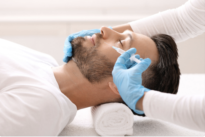 man receiving botox at full circle